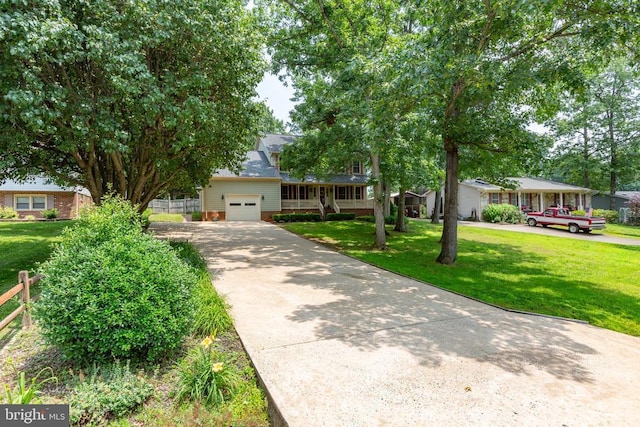 411 Laurel Ave, Fredericksburg, VA 22408 - view of front facade featuring a garage and concrete driveway