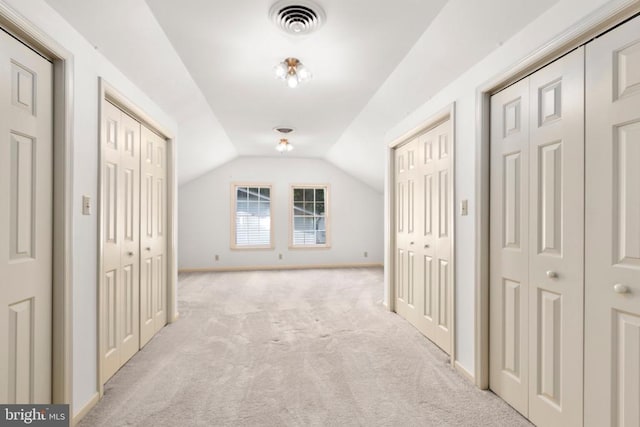 411 Laurel Ave, Fredericksburg, VA 22408 - hallway with light colored carpet and vaulted ceiling