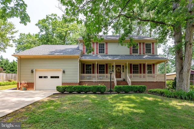411 Laurel Ave, Fredericksburg, VA 22408 - view of front of home with a garage, concrete driveway, and covered porch