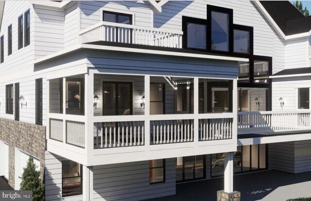 3 Carrs Bridge Rd, Lake Anna, Bumpass, VA 23024 - back of property featuring a balcony