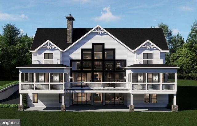 3 Carrs Bridge Rd, Lake Anna, Bumpass, VA 23024 - back of house featuring a balcony, a lawn, and a chimney