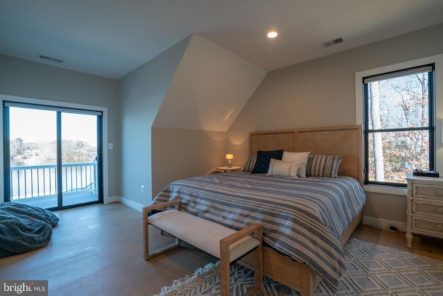 3 Carrs Bridge Rd, Lake Anna, Bumpass, VA 23024 - bedroom featuring baseboards, access to exterior, wood finished floors, recessed lighting, and vaulted ceiling