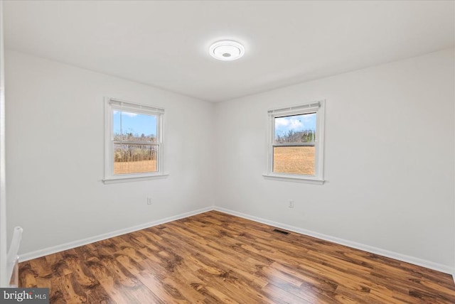 6054 Ridgeview Rd, Madison, VA 22727 - spare room with baseboards and wood finished floors