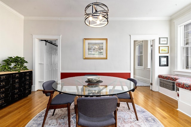 1311 N Augusta St Unit 6, Staunton, VA 24401 - dining room with light wood-type flooring, ornamental molding, a chandelier, and baseboards