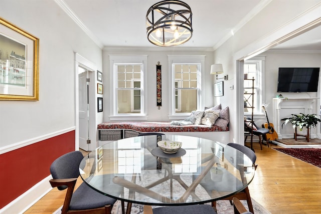 1311 N Augusta St Unit 6, Staunton, VA 24401 - dining space featuring wood finished floors, plenty of natural light, crown molding, and a chandelier