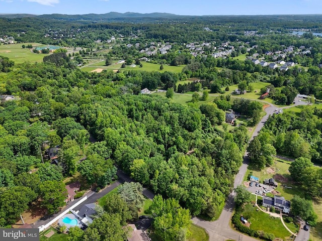  - view of property location featuring a forest