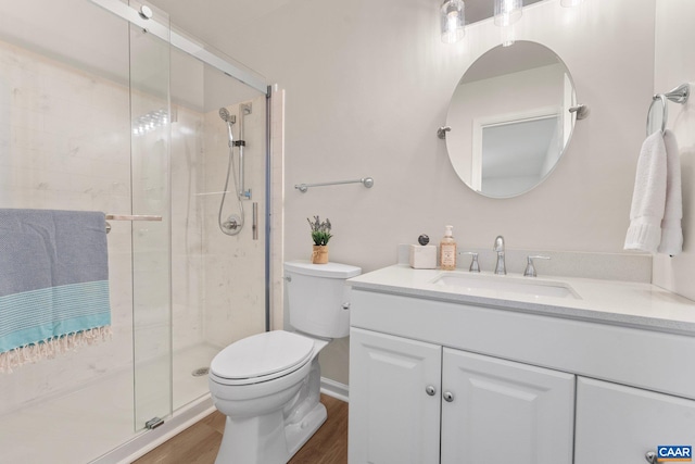 941 Warwick Ct, Charlottesville, VA 22901 - full bathroom with vanity, a stall shower, and wood finished floors
