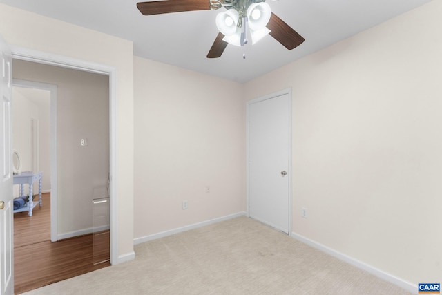 941 Warwick Ct, Charlottesville, VA 22901 - unfurnished bedroom with a ceiling fan and carpet floors