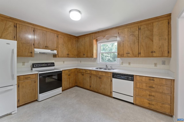 2612 Lawrence Rd, Charlottesville, VA 22901 - kitchen featuring white appliances, light countertops, under cabinet range hood, brown cabinetry, and light floors