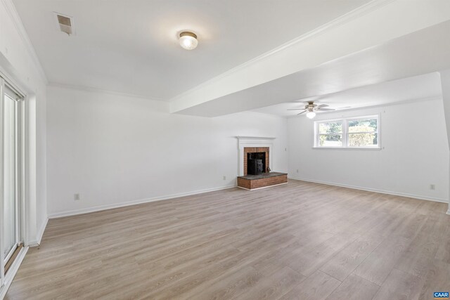 2612 Lawrence Rd, Charlottesville, VA 22901 - unfurnished living room with a ceiling fan, light wood-style flooring, ornamental molding, and a fireplace
