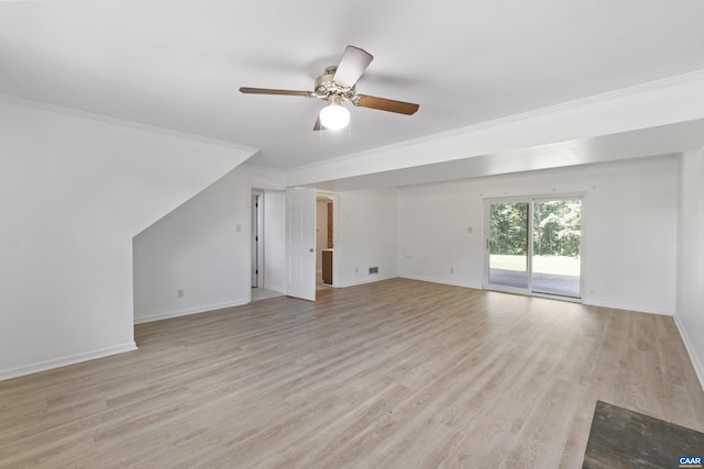 2612 Lawrence Rd, Charlottesville, VA 22901 - unfurnished living room featuring ceiling fan, light wood-style flooring, and ornamental molding