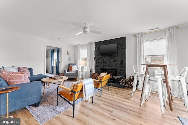 1195 Quaker Run Rd, Madison, VA 22727 - living room featuring light wood-style floors, ceiling fan, and a fireplace