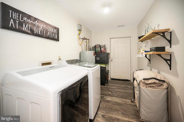 200 Wilderness Ln, Locust Grove, VA 22508 - clothes washing area featuring washer and dryer, dark wood-style floors, and gas water heater