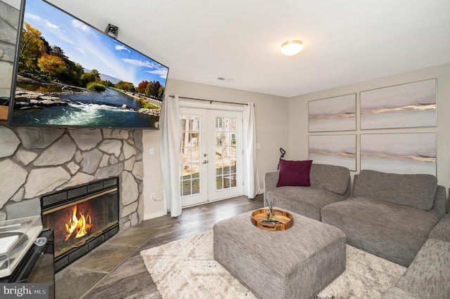 200 Wilderness Ln, Locust Grove, VA 22508 - living room with french doors, a fireplace, baseboards, and wood finished floors