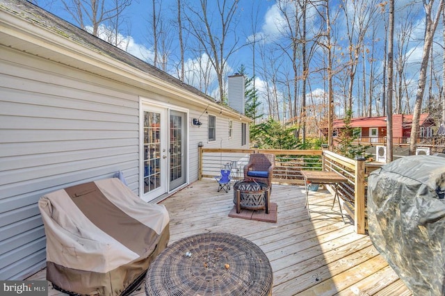 200 Wilderness Ln, Locust Grove, VA 22508 - wooden deck featuring french doors and a grill