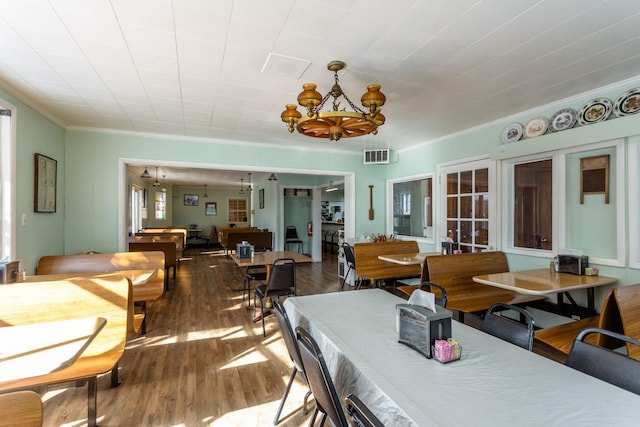 222 Main St, Dayton, VA 22821 - dining room featuring crown molding, a chandelier, and wood finished floors