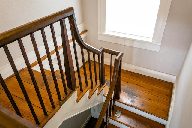 222 Main St, Dayton, VA 22821 - staircase with baseboards and wood finished floors