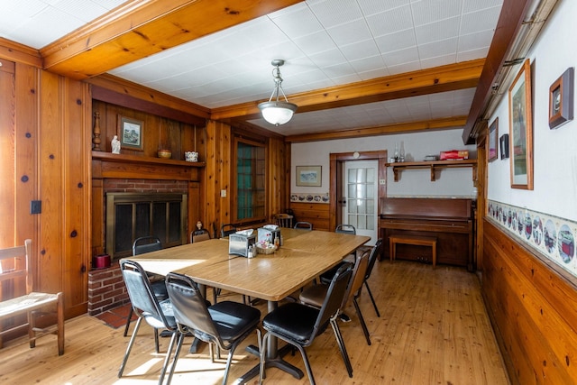 222 Main St, Dayton, VA 22821 - dining area with wooden walls, a fireplace, and light wood-type flooring