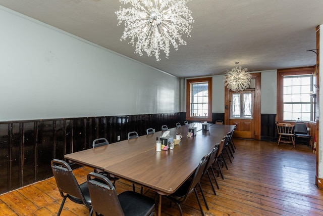 222 Main St, Dayton, VA 22821 - dining area featuring a chandelier, hardwood / wood-style flooring, and wainscoting
