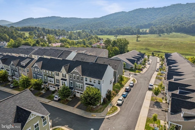 aerial view of residential area with a mountain backdrop