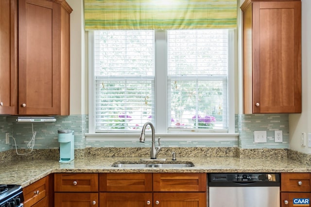 100 Melbourne Prk Cir Unit B, Charlottesville, VA 22901 - kitchen with dishwasher, brown cabinetry, backsplash, and light stone counters