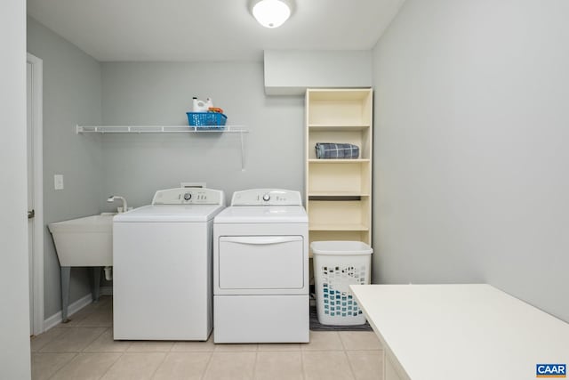 100 Melbourne Prk Cir Unit B, Charlottesville, VA 22901 - washroom with independent washer and dryer and light tile patterned floors