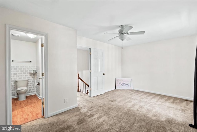 2211 Rock Creek Rd, Fredericksburg, VA 22407 - unfurnished bedroom featuring carpet floors and baseboards