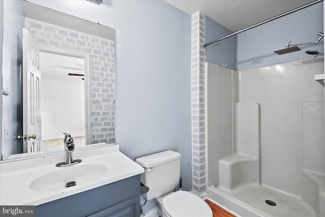 2211 Rock Creek Rd, Fredericksburg, VA 22407 - bathroom featuring a shower stall, toilet, and vanity