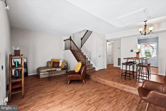 2211 Rock Creek Rd, Fredericksburg, VA 22407 - living area featuring light wood-style floors, stairway, and baseboards