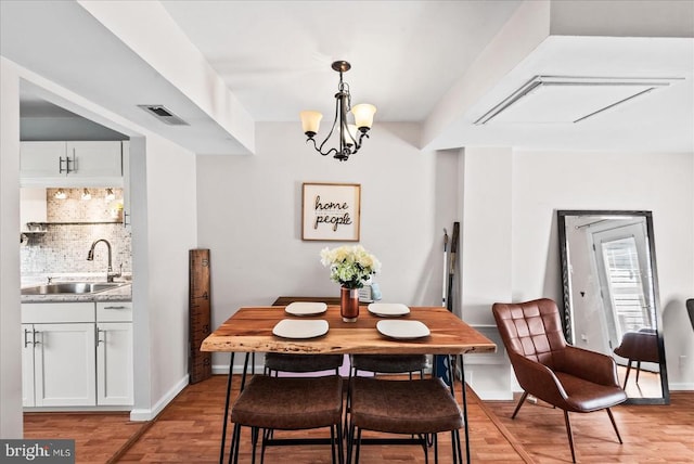 2211 Rock Creek Rd, Fredericksburg, VA 22407 - dining space with light wood-type flooring and baseboards