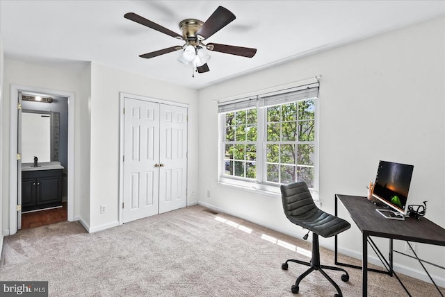 2211 Rock Creek Rd, Fredericksburg, VA 22407 - carpeted home office featuring a ceiling fan, baseboards, and a sink