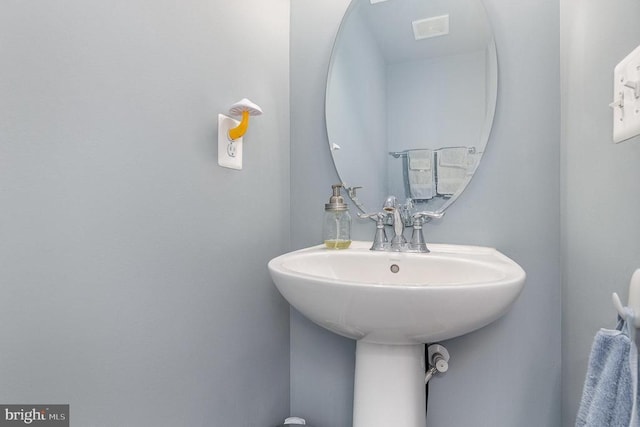  - bathroom featuring a sink