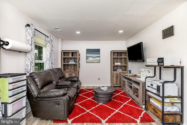  - living room featuring recessed lighting and wood finished floors