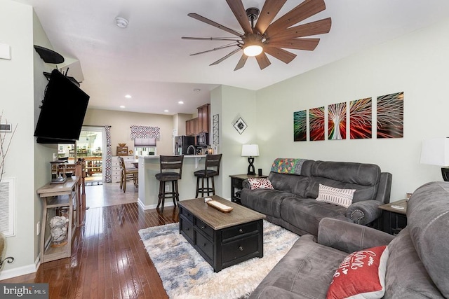  - living area featuring a ceiling fan, dark wood finished floors, and recessed lighting