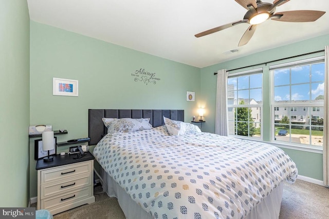  - bedroom with carpet and a ceiling fan