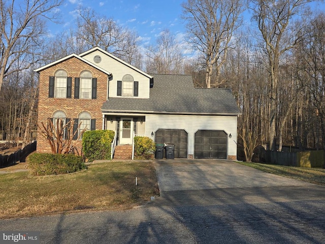 view of front of home with an attached garage, asphalt driveway, a front lawn, brick siding, and roof with shingles