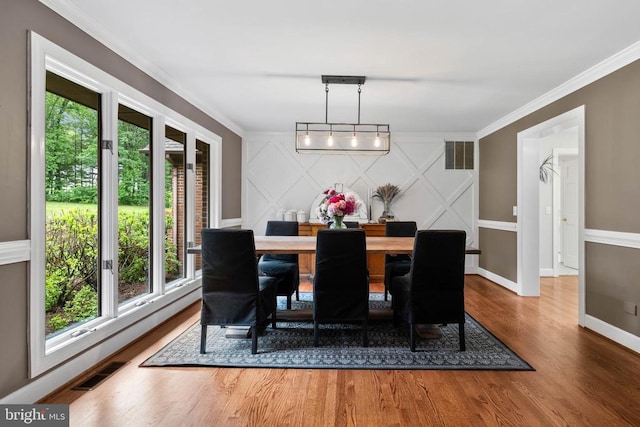 325 Oneals Rd, Madison, VA 22727 - dining room featuring wood finished floors, baseboards, and crown molding