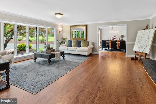 325 Oneals Rd, Madison, VA 22727 - living area featuring crown molding, plenty of natural light, wood finished floors, a chandelier, and baseboards