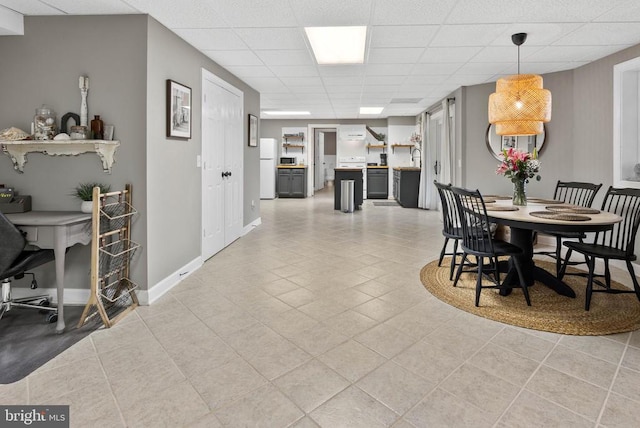 325 Oneals Rd, Madison, VA 22727 - dining area featuring a paneled ceiling, light tile patterned floors, and baseboards