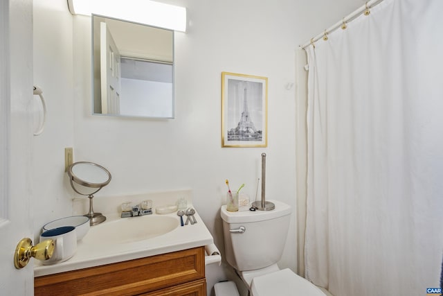 1124 Preston Ave, Charlottesville, VA 22903 - bathroom with toilet, vanity, and curtained shower
