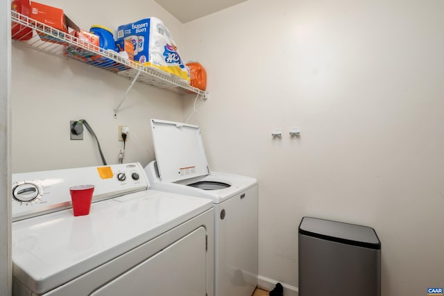 1124 Preston Ave, Charlottesville, VA 22903 - washroom with laundry area, baseboards, and separate washer and dryer
