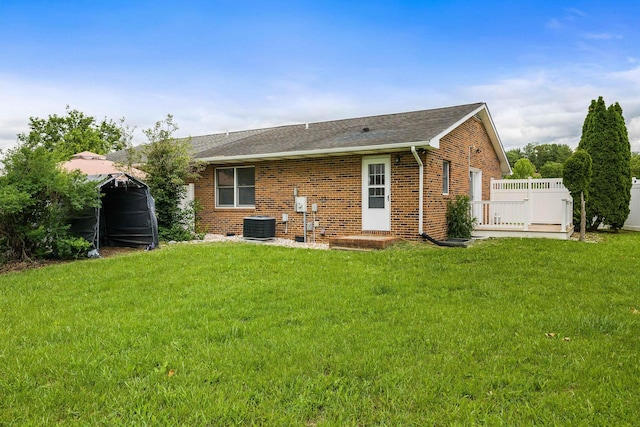 2090 Annandale Ct, Rockingham, VA 22801 - rear view of house featuring brick siding, central AC unit, a yard, a shingled roof, and crawl space