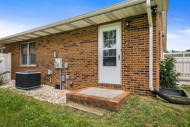 2090 Annandale Ct, Rockingham, VA 22801 - view of exterior entry with cooling unit and brick siding
