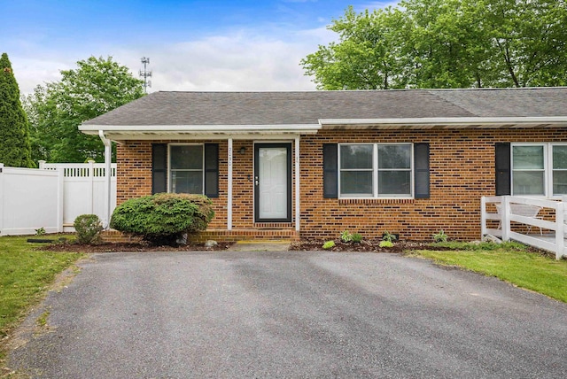 2090 Annandale Ct, Rockingham, VA 22801 - view of front facade with brick siding and roof with shingles