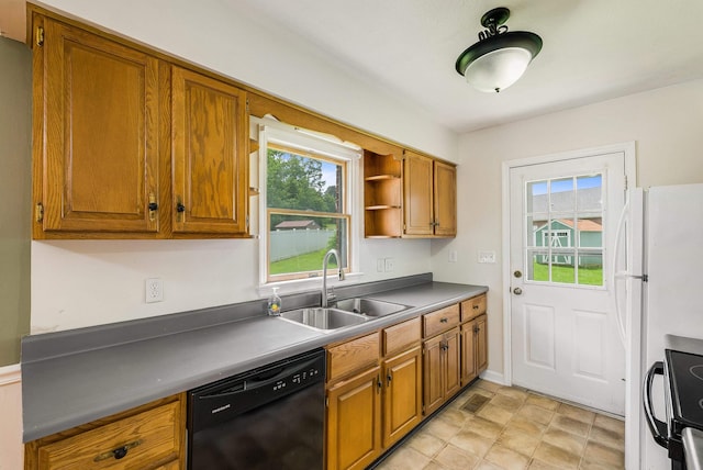 2090 Annandale Ct, Rockingham, VA 22801 - kitchen with black appliances, a sink, brown cabinetry, and dark countertops