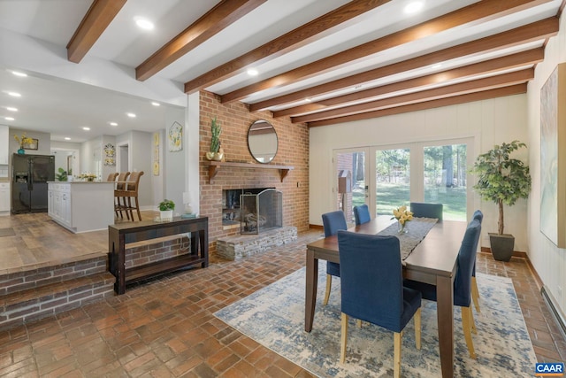 330 Carrsbrook Dr, Charlottesville, VA 22901 - dining space featuring brick flooring, a brick fireplace, beam ceiling, and recessed lighting