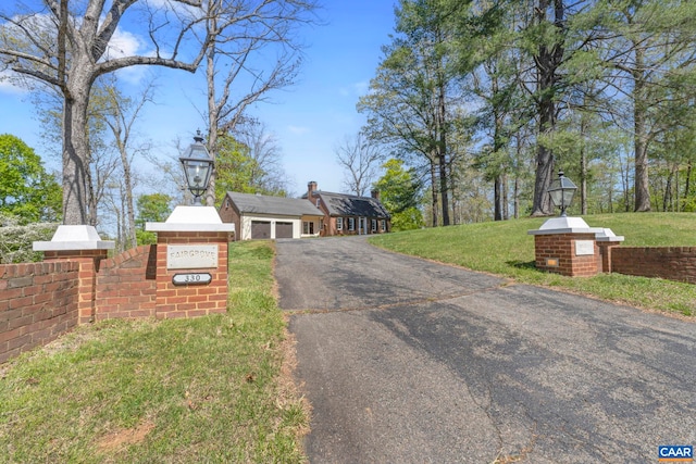 330 Carrsbrook Dr, Charlottesville, VA 22901 - view of front of house featuring driveway, a front yard, and a garage