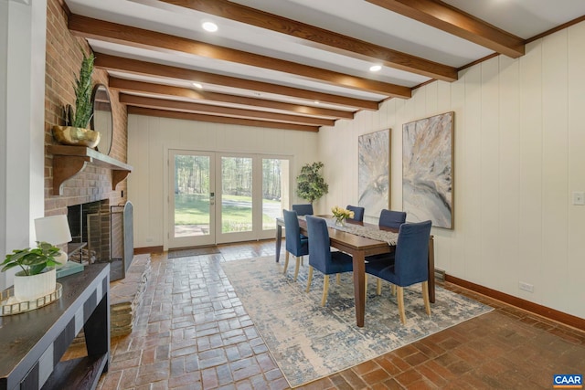 330 Carrsbrook Dr, Charlottesville, VA 22901 - dining space featuring a large fireplace, beamed ceiling, baseboards, and brick floors