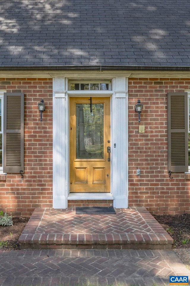330 Carrsbrook Dr, Charlottesville, VA 22901 - entrance to property featuring brick siding and roof with shingles