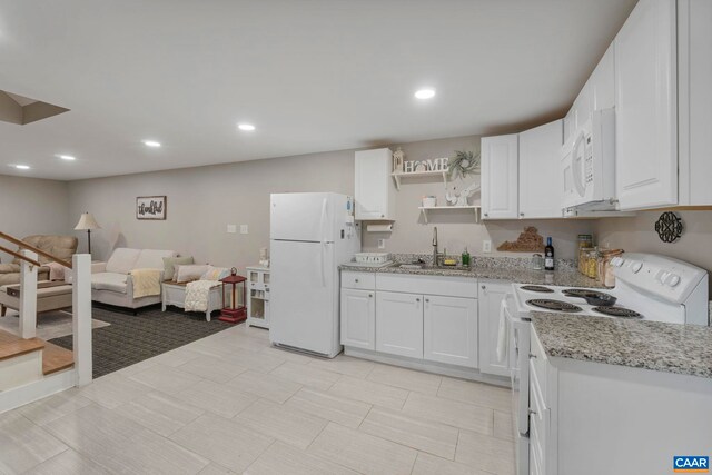 330 Carrsbrook Dr, Charlottesville, VA 22901 - kitchen featuring white appliances, a sink, white cabinetry, light stone countertops, and open shelves